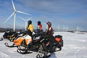 Snowmobilers take in the view in Bingham. Click on the image above for more Maine winter photos - Click on the image above to access more Maine winter images.