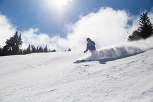Skier at Sunday River - click on the image above or link below to access more Maine winter images.