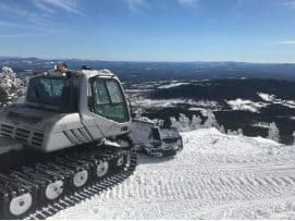 Snow groomer on Coburn Mountain, Maine